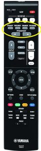 Remote control with buttons circled.