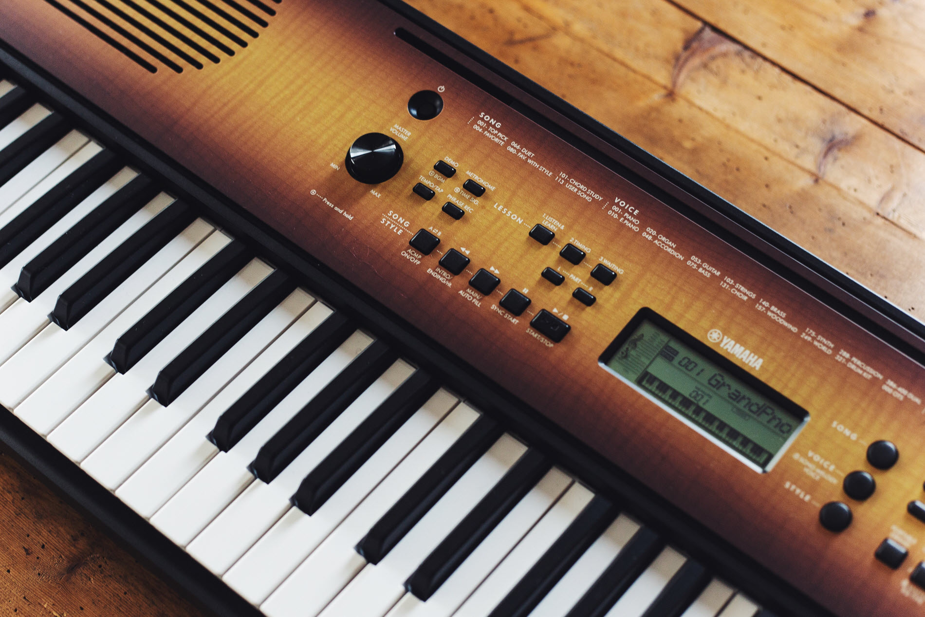 Closeup of an electronic piano keyboard.