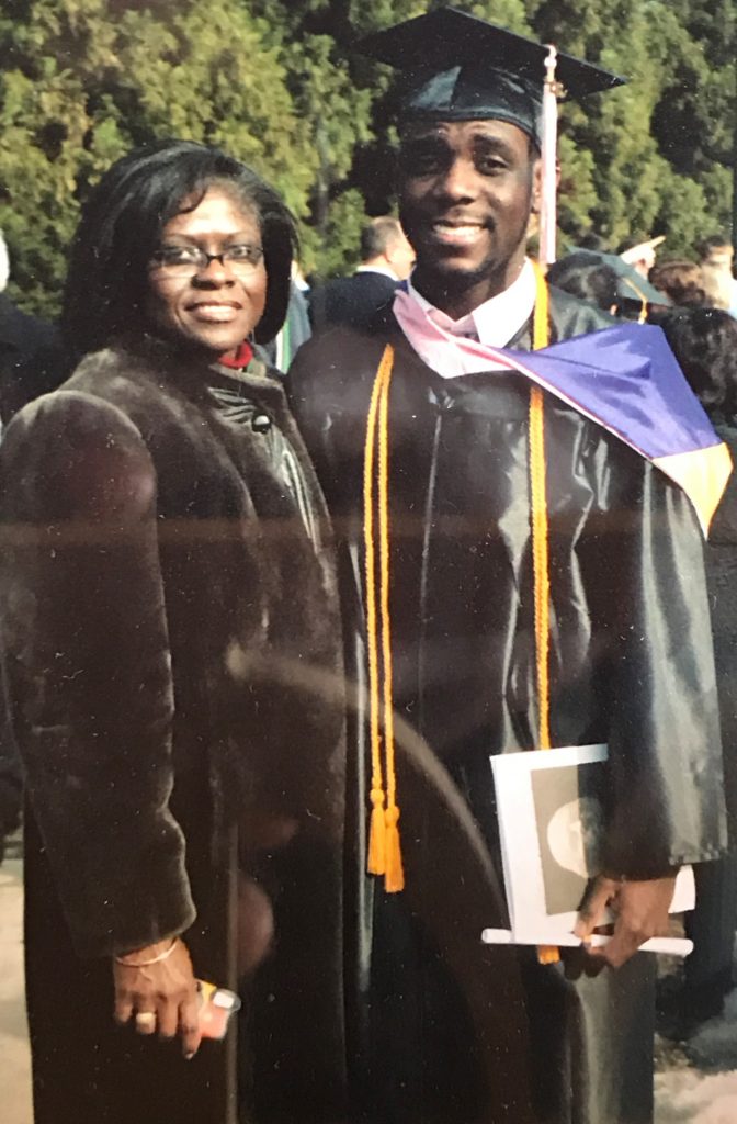 Omar Thomas and his mother at his graduate school graduation.