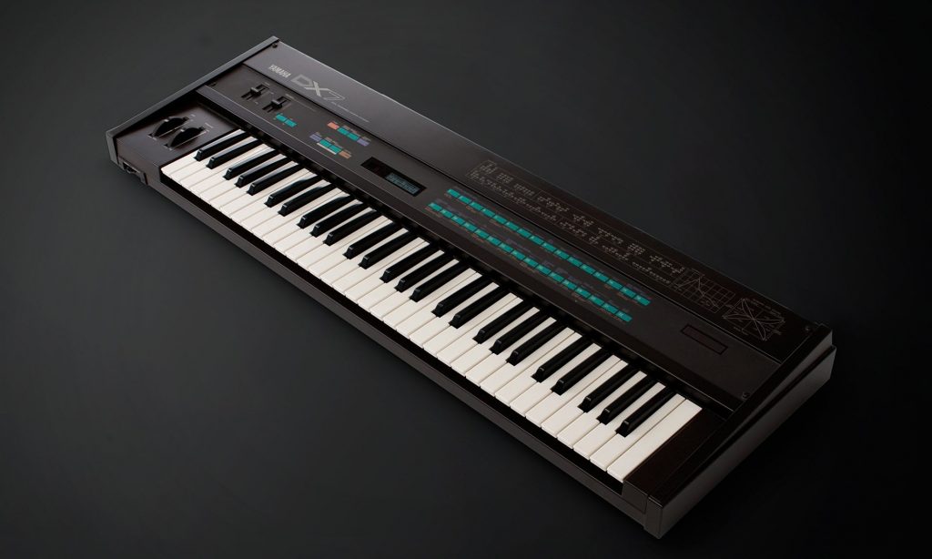 View of Yamaha DX7 music synthesizer as viewed from above.
