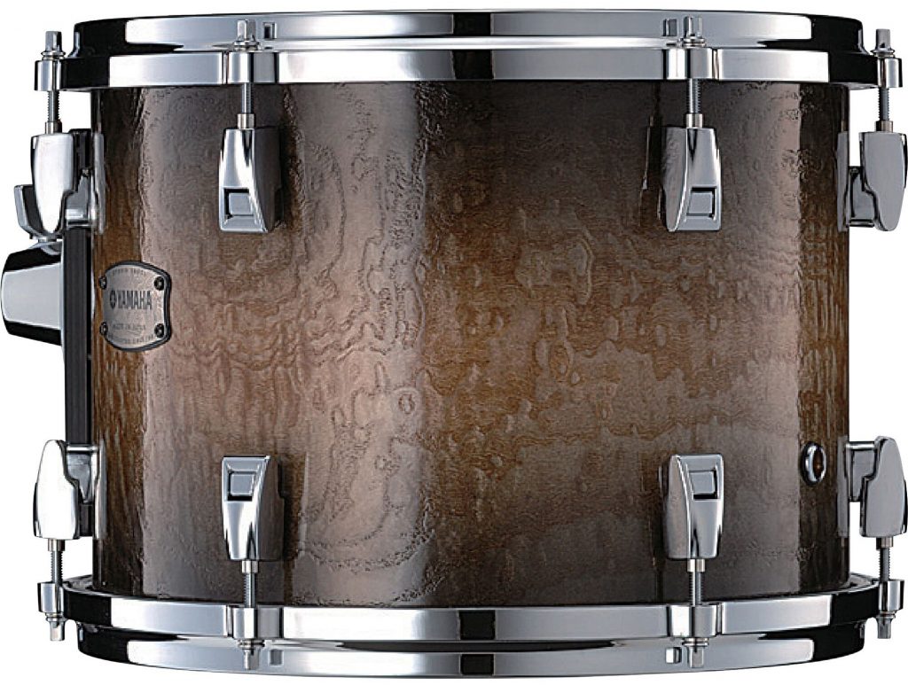 Closeup of a wood-toned drum.