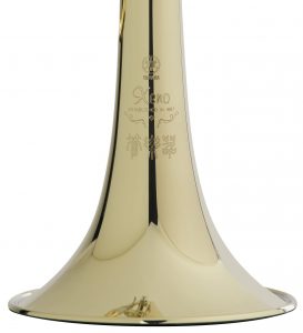 Closeup of the engraving on the bell of the trumpet.