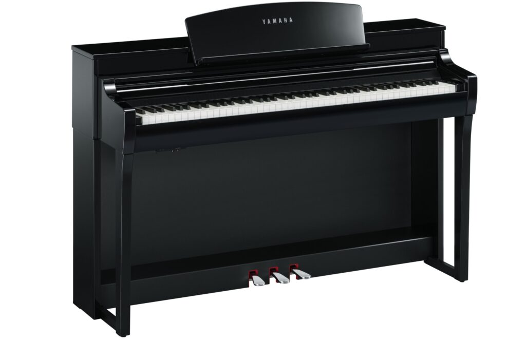 A full-size digital upright piano.