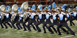 Johnson High School's band performing on the field