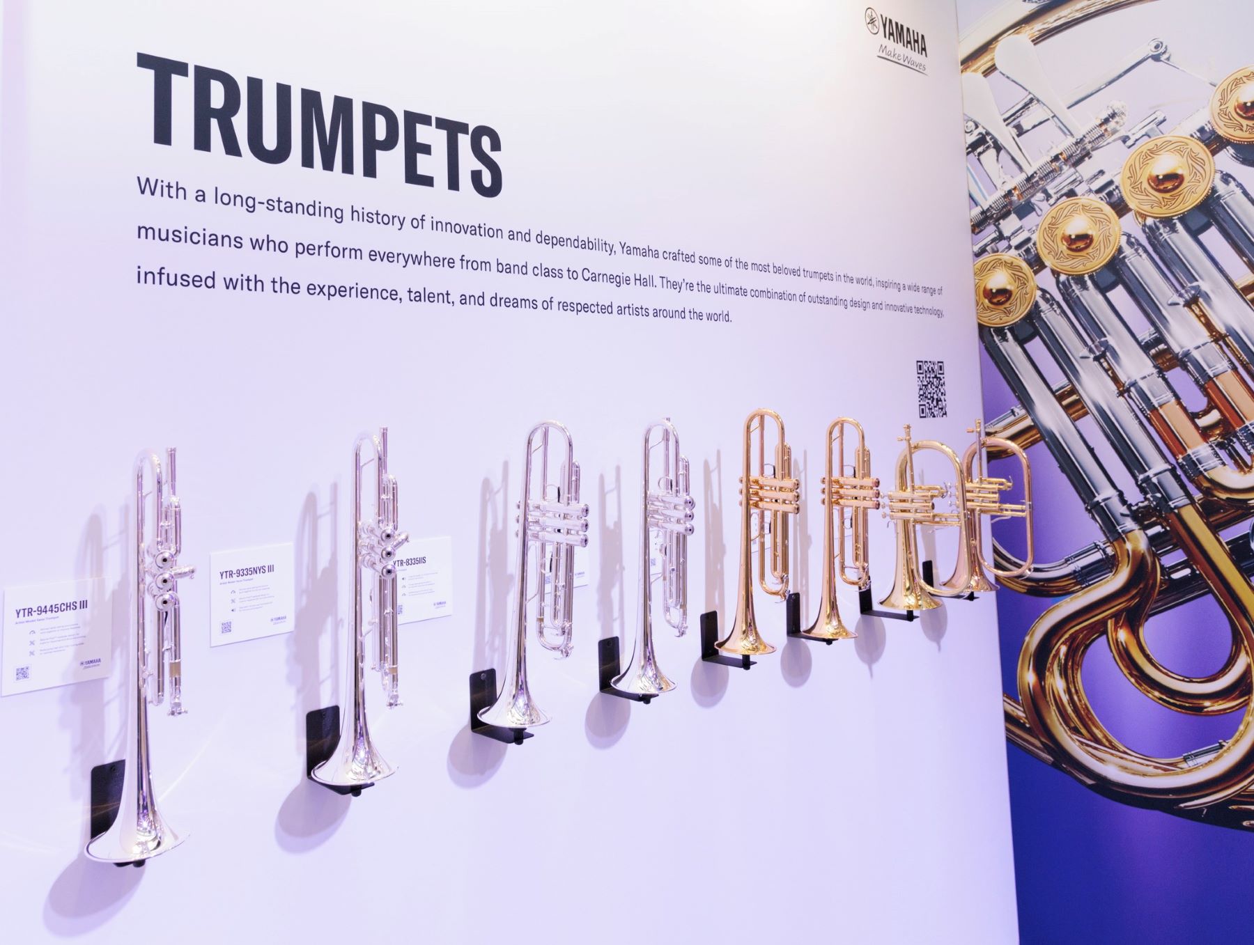 Wall panel with "Trumpets" sign and instruments hanging.