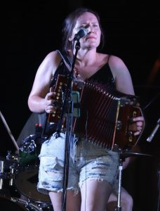 Kylie Griffin performing with zydeco group, Poisson Rouge