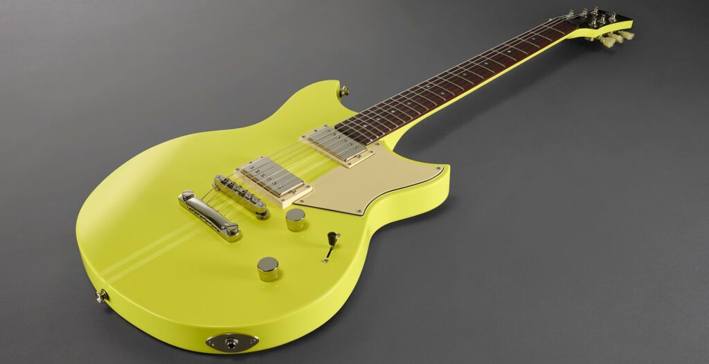 A yellow electric guitar.