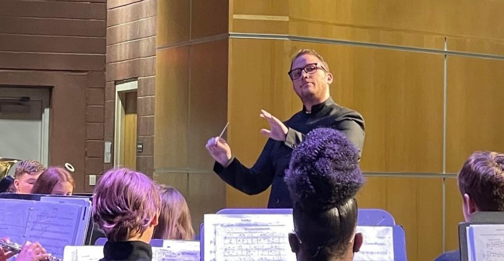 Dylan Sims conducting