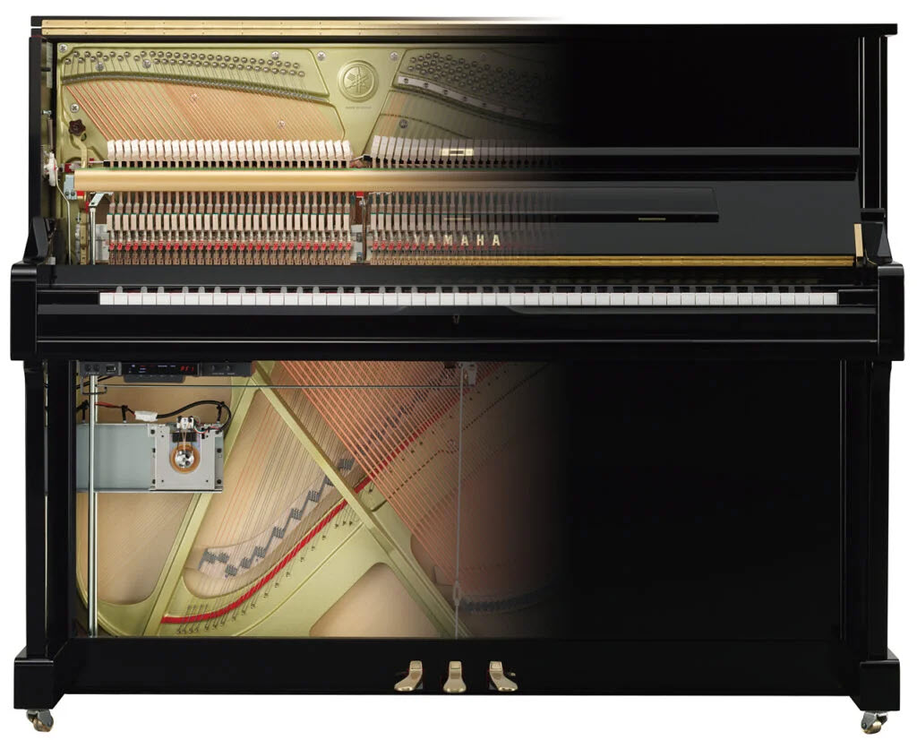 Insides of an upright piano.