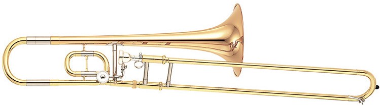Gold and brass trombone in profile.