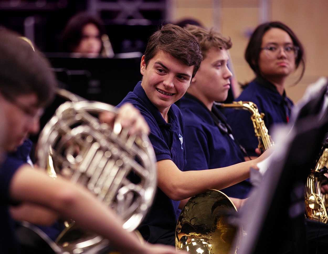 brass section during rehearsal