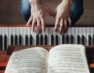 view from above of male playing piano