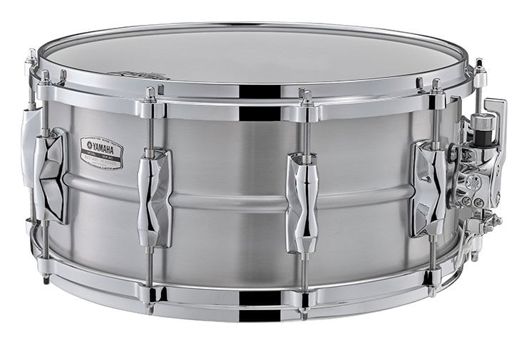 Closeup of metal snare drum.