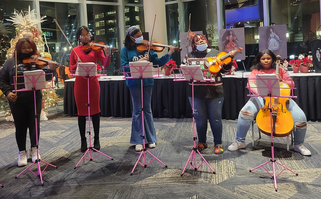 five female students perform at the Nutcracker pre-show