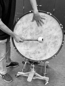 use left hand to dampen bass drum