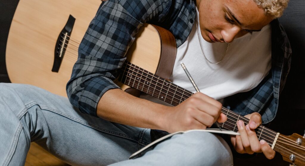guitar player composing
