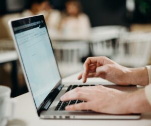 close up of someone using laptop