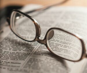 glasses on top of Spanish dictionary