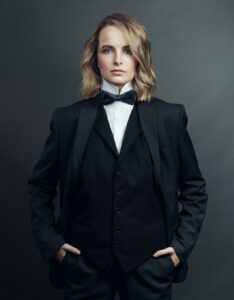 female wearing tuxedo