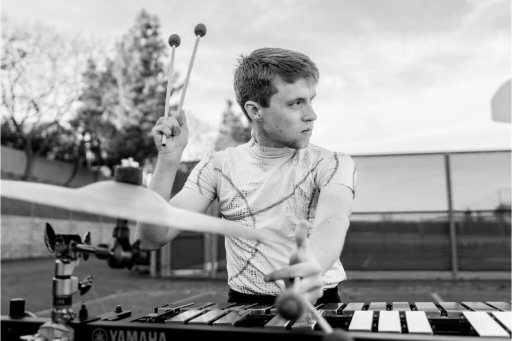 Close-up of percussion player on xylophone.