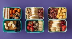 lunches and snacks packed in plastic containers
