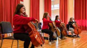 students playing strings instruments
