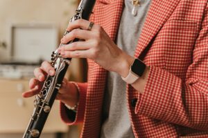 closeup of hands playing clarinet