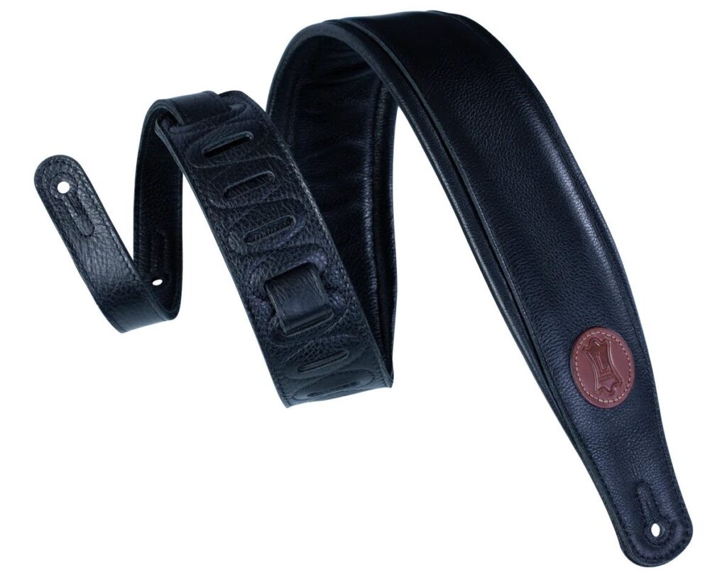 A black leather guitar strap.