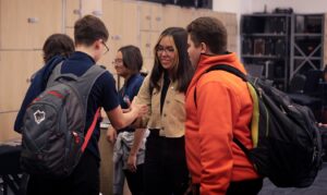 music students talking and smiling 