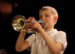 student playing trumpet