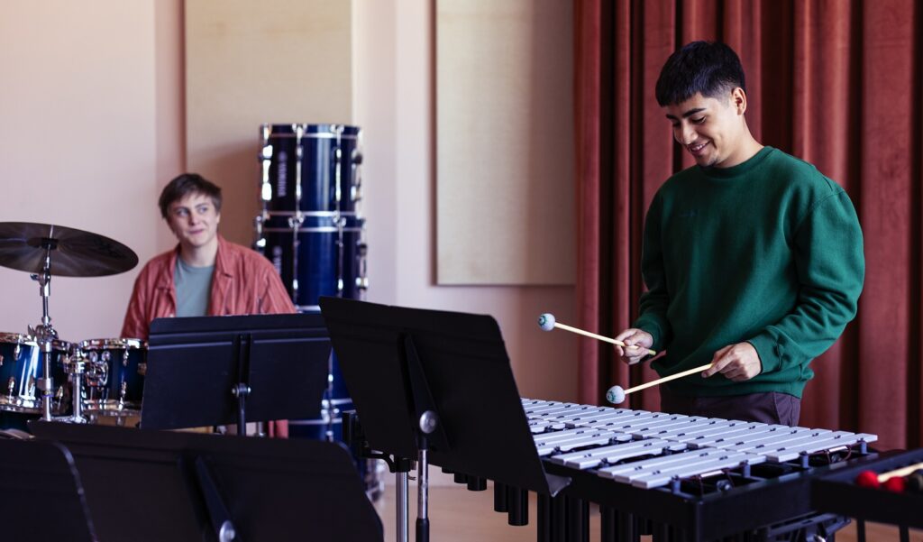 Two percussion students rehearsing