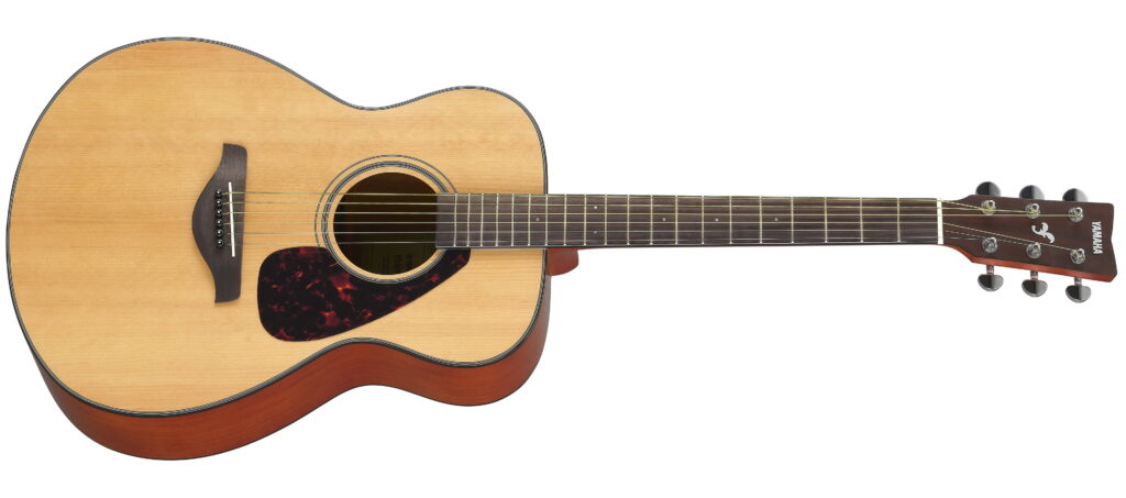 An acoustic guitar with a concert-size body.