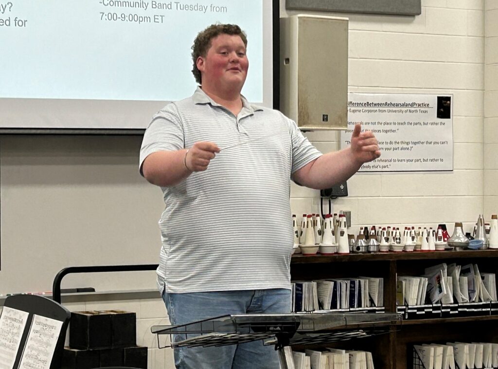 student leader conducting in class
