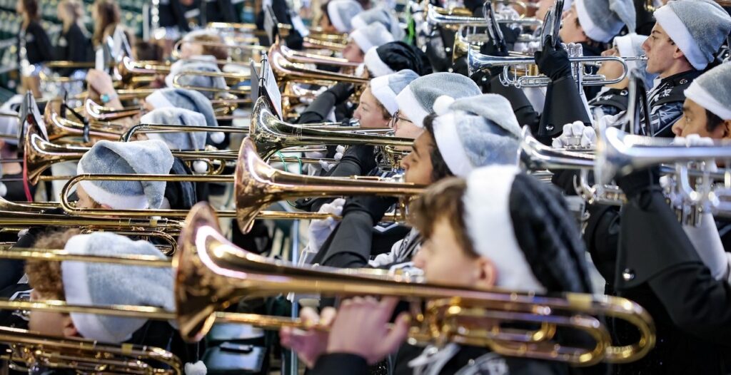 marching band performing from stands