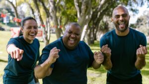 three enthusiastic team members