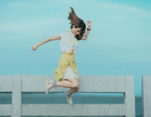 woman jumping for joy