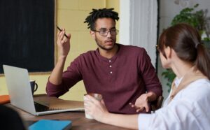 parent and teacher talking