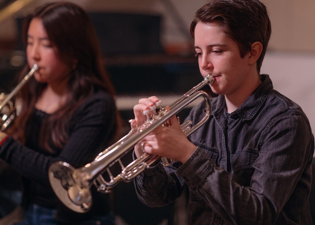 student playing trumpet