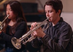 student playing trumpet