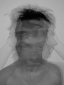 blurred slow motion photo of a man's face