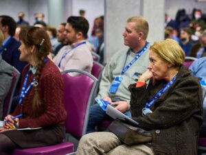 bored conference attendee