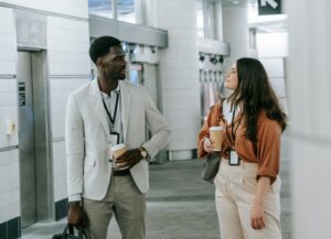 two people chatting at a conference 