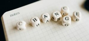 letter dice spelling the words "CHANGE" and "CHANCE" 