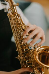 closeup of student playing the saxophone