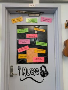 music room door with positive notes on it