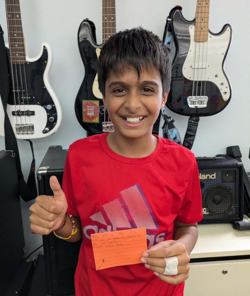 happy student holding his thumb up