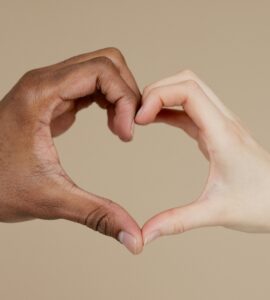 two hands making a heart