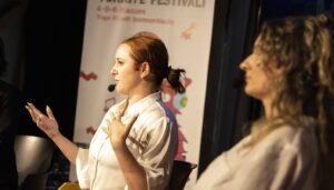 Erin Barra at a panel presentation