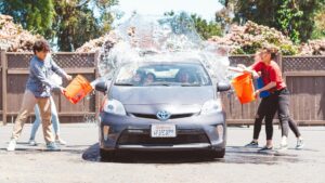 students at a carwash