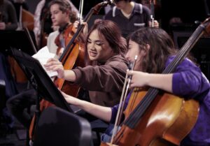 cello section during rehearsal 